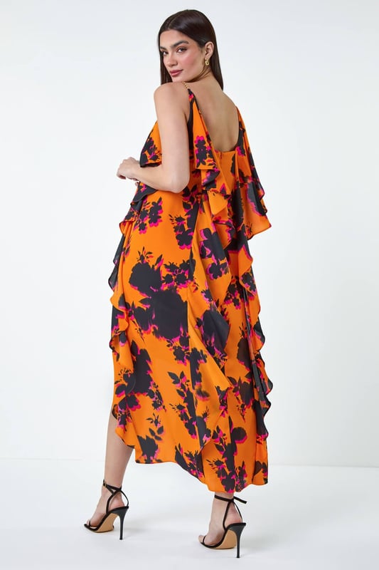 Floral Chiffon Ruffle Detail Midi Dress from Roman. Elevate your Summer wardrobe with this striking ruffle detail midi dress from the Ariella range. Featuring a elegant, cascading waterfall frill detail, this dress has a striking hi-low silhouette to add a touch of drama to your occasionwear. This sleeveless dress with a concealed back zip fastening is crafted from floral printed woven fabric and is fully lined for maximum comfort. The metal trim on the shoulder straps provides a sophisticated edge. Whether you're attending a wedding or a formal dinner, style it with strappy heels and a clutch bag for event-ready glamour!