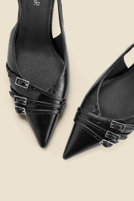 Introducing your AM to PM go-to shoesTimeless slingback style with a sleek pointed toeSet on a comfy-chic kitten heel Elevated with a statement buckle strap detail Adjustable strap for the perfect fit Dress them down with denim, up with