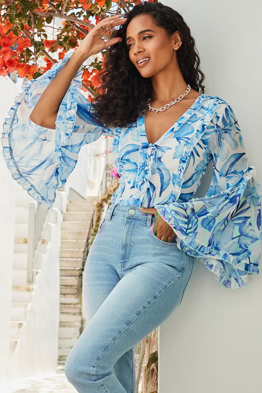 If in doubt, nice top
Crafted from the prettiest chiffon fabric
Voluminous fluted sleeves for a gorgeous silhouette
Ruffle trims amplify the dreaminess
Cut to pair perfectly with jeans or linen trousers
We love it with white denim and a raffia bag