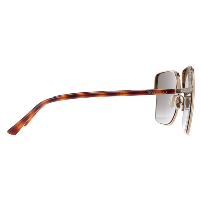 Jimmy Choo Square Womens Gold Havana Brown Gradient ALIANA/S  Sunglasses are sleek square frame, enhancing your facial features while providing optimal sun protection. The high-quality metal material used in their construction ensure durability and comfort, making them the ideal companion for both everyday wear and special occasions. The Jimmy Choo logo features on the slender temples for brand authenticity.