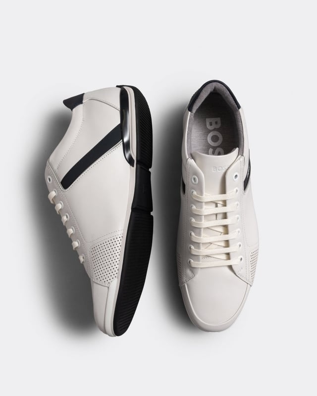 Distinctive trainers by BOSS, designed in leather with stitch-and-turn details, thermo-bonded accents, rubberised trims and odour-control lining.
LacesFully linedPackaging: Box
48% Polyester, 48% Viscose, 4% Polyurethane, Sole: 80% Rubber, 20% Thermoplastic polyurethane, Upper material: 100% Cow skin, Innersole: 48% Polyester, 48% Viscose, 4% Polyurethane
 
50498282
 
 
