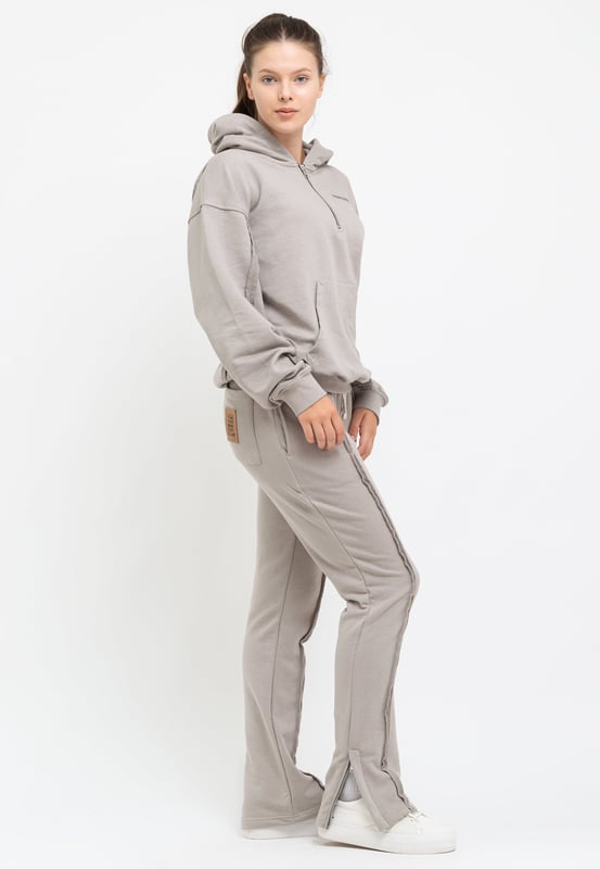 Tom Barron Dames trainingspak met kwart rits en logo in oversize