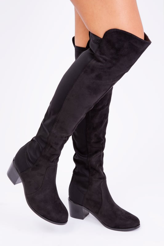 Thigh high hot sale boots mid heel