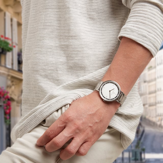 This Pierre Cardin Belleville Park Analogue Watch for Men is the perfect timepiece to wear or to gift. It's Silver 41 mm Round case combined with the comfortable Silver Stainless steel watch band will ensure you enjoy this stunning timepiece without any compromise. Operated by a high quality Quartz movement and water resistant to 3 bars, your watch will keep ticking. This fashionable and classic watch matches any outfit at any occasion,it adds style to your life High quality 21 cm length and  18 mm width Silver Stainless steel strap with a Fold over with push button clasp Case diameter: 41 mm,case thickness: 5.8 mm, case colour: Silver and dial colour: White