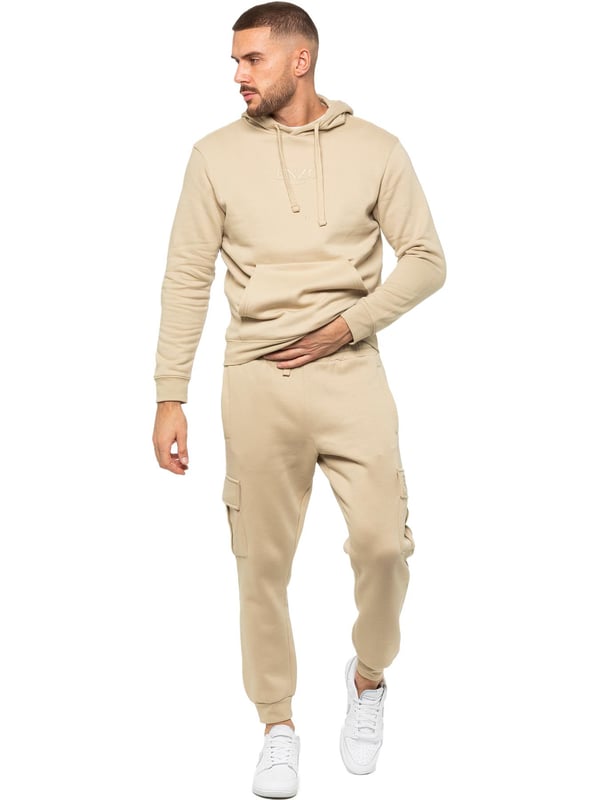 Enzo Mens Overhead Hoodie Tracksuit Set. Regular Fit, Long Sleeve Hoodie with Cuffed Wrists and Adjustable Drawstrings. Features EZ Logo On Chest And Joggers. Regular Fit Cargo Jogger. Elasticated Waistband With Adjustable Drawstring. Features 2 Side Slash Pockets, 2 Cargo Pockets, Single Welt Back Pocket. Ideal to use for Casual and Work wear.
