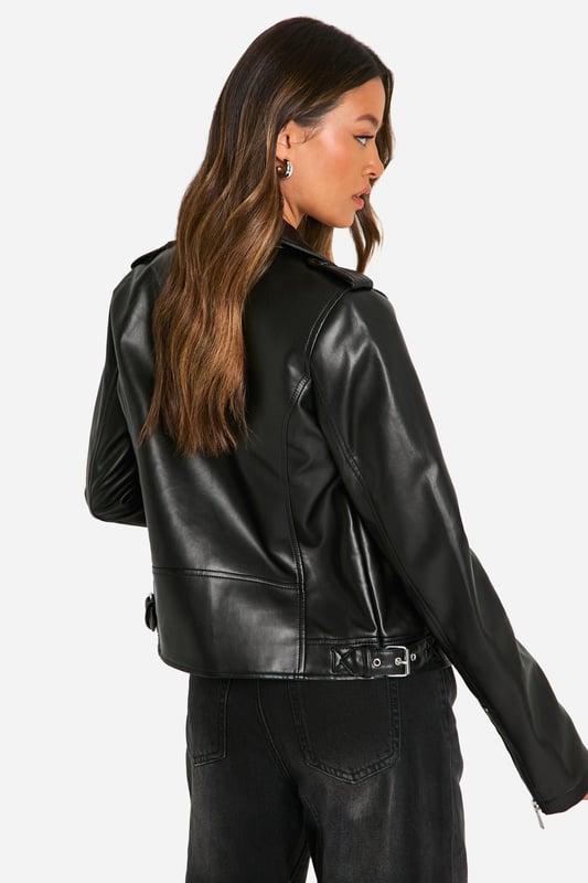 Classic biker jacket silhouette with notched lapels
        Asymmetrical front zip closure for edgy appeal
        Multiple functional zipped pockets for practicality
        Adjustable waist belt for a customised fit
        Long sleeves with zip cuffs for added style
    
    Embrace your inner rebel with this timeless tall biker jacket from Boohoo. Perfect for the fashion-forward woman who craves versatility, this jacket effortlessly transitions from day to night. Style it with wide-leg trousers and trainers for a casual daytime look, or throw it over a mini dress and ankle boots for an evening out with friends. The jacket's sleek silhouette and edgy details make it an ideal choice for family gatherings or casual events where you want to make a statement without overdoing it. Its adaptable nature allows you to create countless outfits, ensuring you're always on-trend and ready for any occasion. Easy to maintain with a simple wipe-down, this jacket is a practical yet stylish addition to your wardrobe that will serve you well for seasons to come.