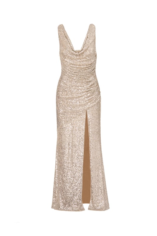 Add glamor to your next night out with this sequin gown. This formal dress features a sleeveless bodice, cowl neckline, and a mermaid skirt with a side slit. Made from stretch sequin fabric, this gown is fully lined and ultra comfortable. Gathered details at the sides creates a beautiful, shirred effect, which flatters the figure. A side zipper closure completes this evening gown. Style this sequin dress with nude heels and a satin clutch for a look that will belong in any room you walk into.