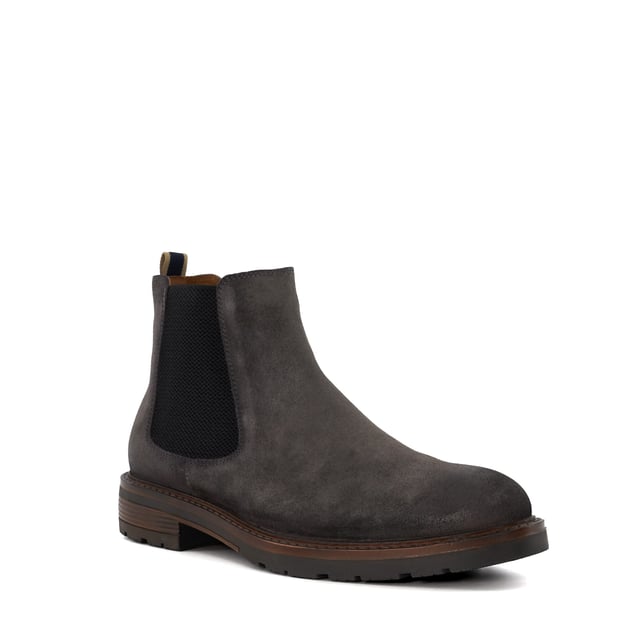 Dune Mens CHELTENHAM Casual Chelsea Boots Expertly constructed from the finest material, this timeless and traditional silhouette will provide a sartorial foundation to any wardrobe. Constructed with elastic side panels, a convenient back-pull-on tab, and a rubber sole for added comfort, our Cheltenham Chelsea boot fuses master craftsmanship with contemporary British styling.