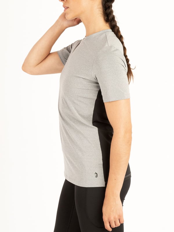 Train in style with this crew neck t-shirt from the LUKE womenswear performance range. Cut from a high performance, recycled fabrication, it is designed with comfort, sustainability and flexibility in mind. The fabric has moisture absorbing properties and elastic fibres for ultimate support when on the move. This piece is complete with the brands iconic rubberised lion head badge at the hem.