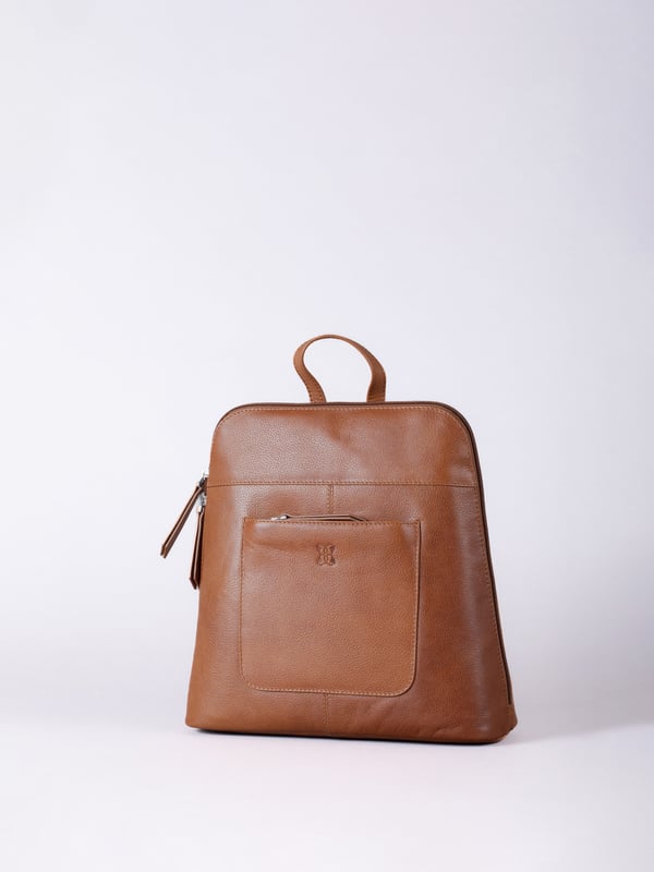 The Talkin handbag collection is a study in sleek sophistication, and this practical backpack is no exception. Crafted from soft premium leather, this classic style has plenty of space to ensure you can carry all your essentials with ease. The adjustable leather straps offer unparalleled comfort, and we've included a grab handle for convenient carrying.