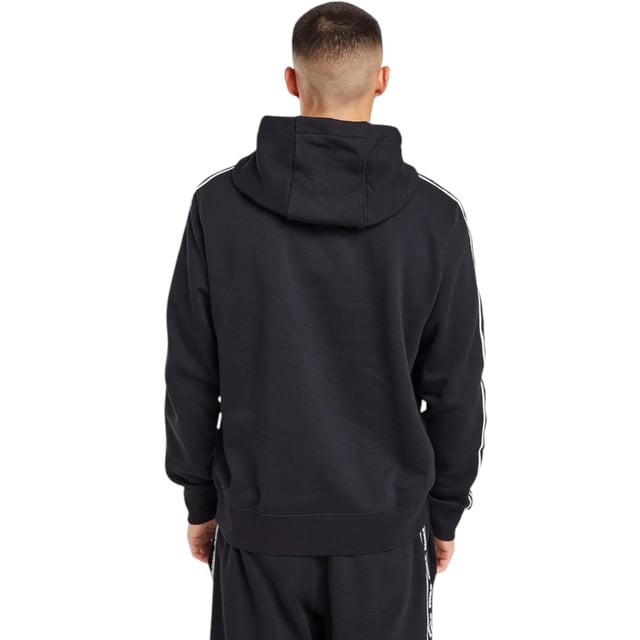 Nike Aries Club Tape Mens Pullover Hoodie In Black Freshen up and step out in this men's Aries Hoodie from Nike. In a Black colourway, this regular-fit pullover is made from a soft cotton and poly blend for lasting comfort. It has a drawcord-adjustable hood for custom coverage, stretchy ribbed trims to hold the shape and a kangaroo pocket for your essentials. Finished up with taped Nike branding down the sleeves and a Nike Futura badge embroidered to the chest.