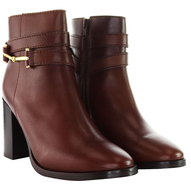 Indulge in the intersection of chic style and contemporary flair with the Ted Baker Anisea T-Hinge Women's Ankle Boots. Elevating your footwear collection with a perfect blend of sophistication and modern design, these ankle boots are sure to make a bold fashion statement.

Key Features:

 T-Hinge Embellishment:  The Ted Baker Anisea Boots feature the distinctive T-Hinge embellishment, a signature element that adds a touch of glamour and uniqueness to the ankle boots. This stylish detail not only catches the eye but also reflects Ted Baker's commitment to intricate design.

 Ankle Boot Silhouette:  Embrace a sleek and versatile silhouette with these ankle boots. The shorter height allows for easy pairing with a variety of outfits, making them a versatile choice for both casual and more formal occasions.

 Comfortable Fit:  Experience comfort without compromising style. The Anisea Boots are designed to provide a snug and comfortable fit, allowing you to walk with confidence throughout the day.

 Side Zipper Closure:  Effortlessly slip into these ankle boots with the convenient side zipper closure. This practical feature not only ensures easy on-and-off wear but also maintains the clean lines of the design.

Step into a world of fashion-forward elegance with the Ted Baker Anisea T-Hinge Women's Ankle Boots â€“ a perfect choice for those who appreciate distinctive design, luxurious materials, and versatile styling options. These boots effortlessly embody the essence of Ted Baker's commitment to timeless yet contemporary footwear.