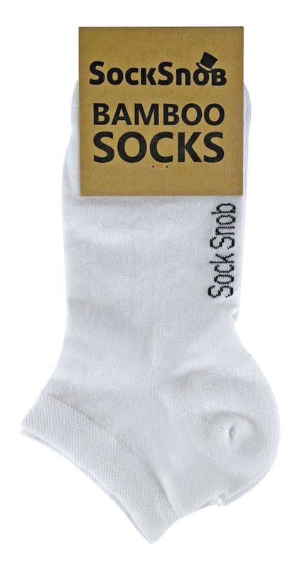 Trainer socks are an essential part of our sock drawers. When the warm summer weather hits we finally start to wear them frequently, not just for sport but for casual everyday wear or . But, they might only last one season, especially if they are cheap, low quality and made from regenerated cheap cotton material. We have developed trainer socks made of luxurious natural bamboo, finely knit to maximise the softness of the bamboo fibre on your skin. Want one of the best packs of bamboo socks you’ve ever come across. Then this pack of bamboo trainer socks for men and women is for you. Bamboo as a fibre is luxuriously soft thanks to its natural properties and is far superior to cotton. Bamboo also wicks moisture away from the foot naturally. So, if you are sweating a lot because you are playing sports or the weather is scorching hot then you will find that your feet will sweat much less than if you were wearing normal cotton trainer socks. These bamboo sneaker socks would be perfect to wear with any kind of shoe during the summer months, especially when the temperatures really start to rise. They are breathable due to their knitting type, extremely thin socks that allow air to travel through the yarn and to help cool your feet down. To mark a true sign of quality, these finely knit 200 needle bamboo socks are finished off with the Sock Snob print on the bottom of the foot. These bamboo trainer socks are available in three colours including black, white and natural. They are available in 2 sizes in 6-11 UK 7-12 US 39-45 EU and 4-7 UK 5-8 US 37-42 EU for additional comfort. They are packaged with recyclable cardboard and bags and they are machine washable.