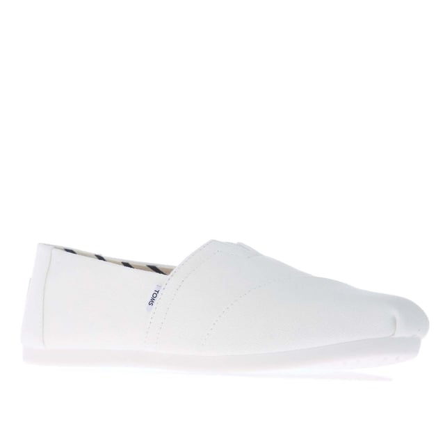 Womens Toms Recycled Cotton Canvas Alpargata Espadrille Pumps in white.- Recycled cotton upper  lining and sock-liner made with 50% recycled cotton.- Classic Alpargata design.- Toe-stitch and elastic V for easy on and off.- Chevron patterned canvas lining.- Custom insoles made with 50% eco content including recycled PU foam.- Direct injection outsole for flexibility and durability with tread pattern for improved traction.- Toms branding to side and back of heel.- 100% vegan construction.- Textile upper  Textile lining  Synthetic and textile sole.- Ref:10017739