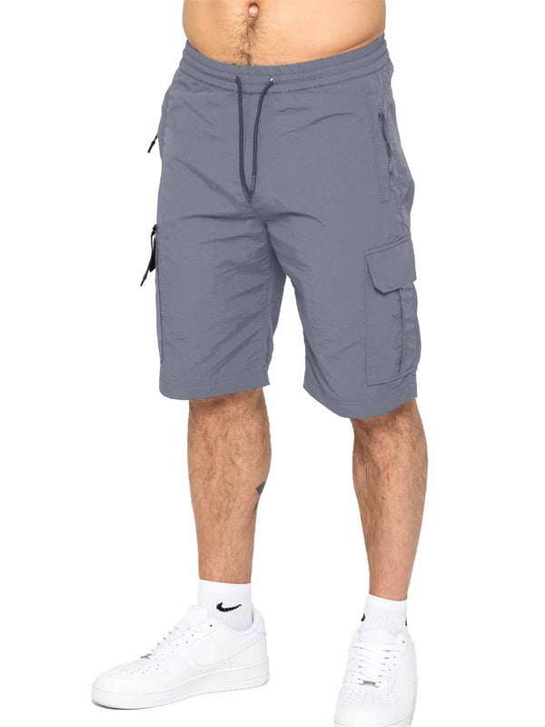 Engineered for comfort and versatility, these poly cargo shorts will elevate your casual wardrobe. Made from a durable woven crinkle fabric, they boast a relaxed elasticated waist and drawstring fastening for a perfect fit. Stay organized with zip-fastened side and leg pockets, adding a touch of utility to your summer ensemble. Pair with a classic t-shirt and trainers for effortless style.
