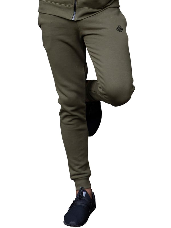 Crafted from Soft and Light Polyester, these Enzo Designer Joggers feature Elasticated Waist with drawstring and an Enzo Logo Embroidery on Leg. Matching Tracksuit Hoodie Available. Ideal for Autumn, Winter, Spring Seasons wear Casually, Sports or Off leisure