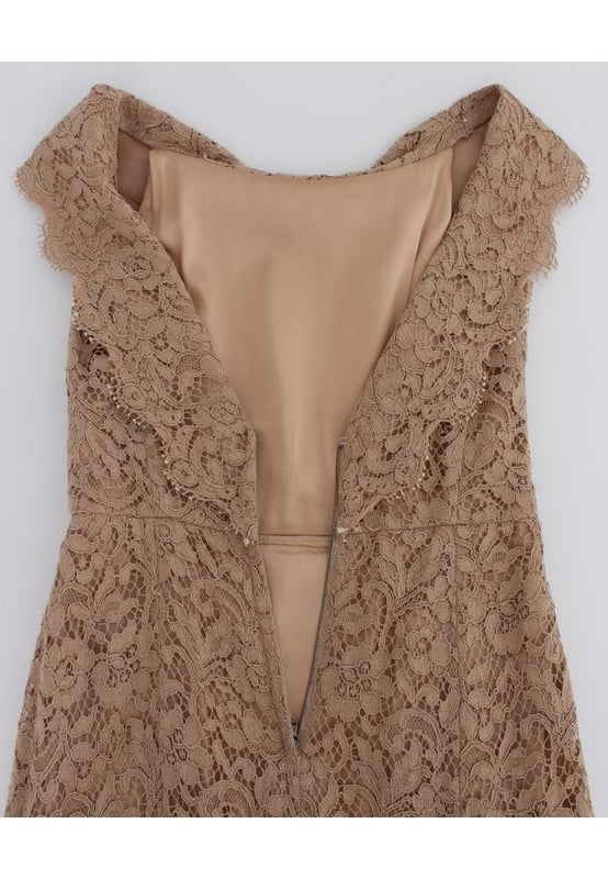 Marke: Dolce & Gabbana  
Stil: Maxi-Sheath-Kleid  
Farbe: Pink  
Material: 55% Baumwolle, 20% Nylon, 25% Viskose  
Futter: 96% Seide, 4% Elastan  
Seidiger Stretch-Innenfutter für zusätzlichen Komfort  
Reißverschluss hinten für ein einfaches Anziehen  
Logodetails auf dem Kleid  
Hergestellt in Italien  