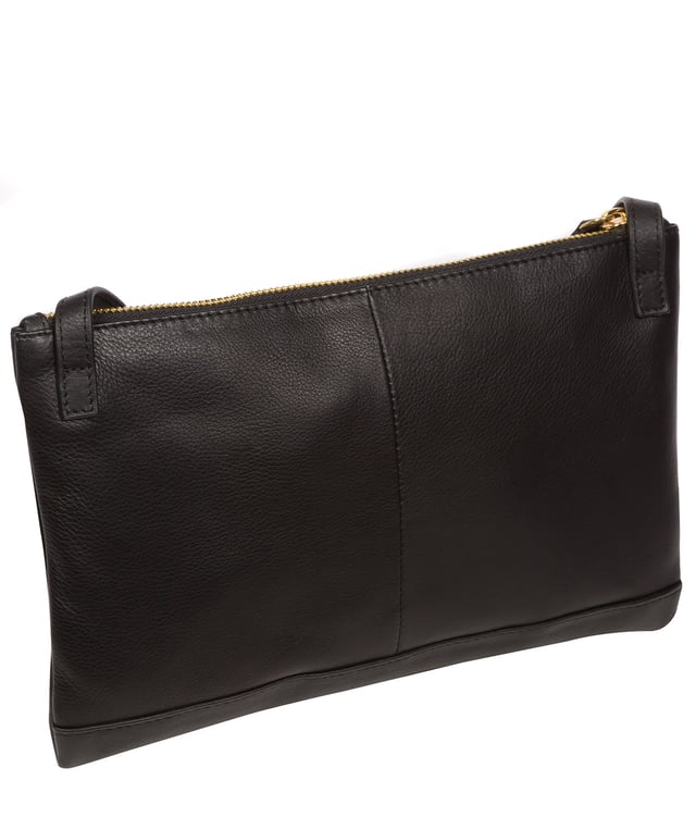 Crafted from high-quality Nappa leather, the 'Anya' cross body bag from Pure Luxuries London's Marylebone Collection is a must-have thanks to the super soft-to-the-touch feel and finish. A stylish zip-over top secures the central compartment which is lined with 100% cotton for a flawless look. Additional storage is provided by three card slots and a slip pocket, perfect for all your essentials. This accessory is adorned with a slim and adjustable strap with a maximum drop length of 65cm and complemented by eye-catching gold-coloured metal fittings and zips which give it an elegant look. The Pure Luxuries logo is embossed for an effortless and sophisticated finishing touch.