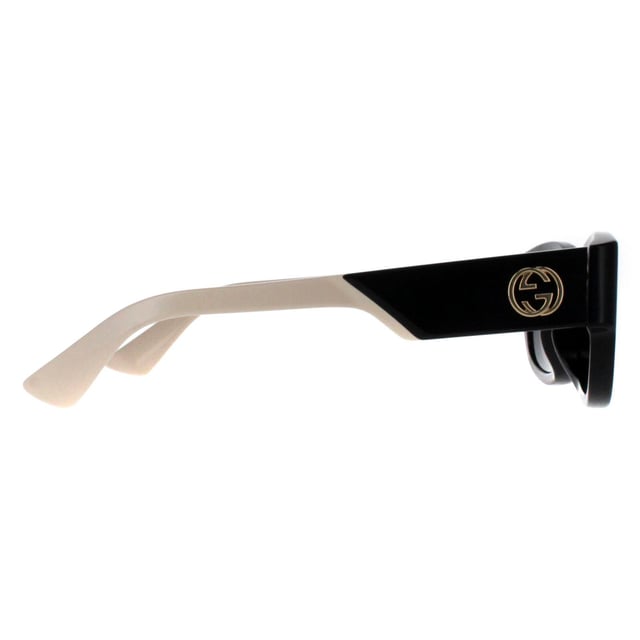 Gucci Square Womens Black with Ivory Grey GG1667SK  Sunglasses feature a refined square shape that adds a touch of vintage allure, these sunglasses embody sophisticated charm while maintaining contemporary appeal. The GG1667SK is adorned with the signature double-G logo on the temples, reinforcing Gucciâ€™s reputation for luxury and attention to detail. The high quality lenses offer excellent UV protection, ensuring comfort and eye safety without compromising style.