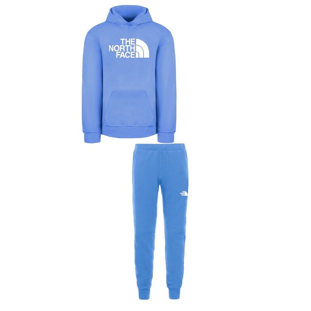 Prepare your little one for comfort and style with The North Face Slacker Kids Tracksuit – a versatile and cozy outfit perfect for various activities. Here's a detailed description highlighting the key features of this kids' tracksuit:
&gt;
 The North Face Logo:  The iconic The North Face logo is likely featured on both the jacket and pants, showcasing the brand's commitment to outdoor exploration and adventure. The logo adds authenticity and a sporty touch to the tracksuit.

 Comfortable Fabric:  Crafted from comfortable and soft fabric, the tracksuit provides a cozy feel against the skin. This is essential for active kids, ensuring they can move freely and comfortably during various activities.

 Elastic Waistband:  The pants are likely equipped with an elastic waistband, providing flexibility and ease of wear. The elastic waist ensures a comfortable fit for active kids who are constantly on the move.

 Versatile Styling:  The coordinated design and solid blue color make this tracksuit versatile for various occasions. It can be worn for casual outings, playdates, or as a comfortable choice for travel.

 Encouraging an Active Lifestyle:  The North Face Slacker Kids Tracksuit is not just clothing; it's an encouragement for an active and adventurous lifestyle. The durable and comfortable design is tailored to keep up with the energy and curiosity of young explorers.