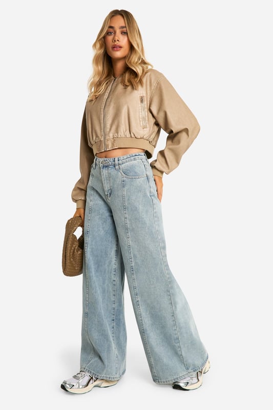 Seam Detail Extreme Wide Leg Denim Jeans Perfect for a new season update, the wide leg jean is your chance to make an effortless fashion statement when it comes to denim-led outfits. Anything but basic, our high waisted wide leg jeans are made from rigid denim, making them the perfect quality jean for day-to-day 'fits. Step out in retro-inspired wide jeans teamed with a basic white tee and oversized blazer for a look that brings vibes to all your plans. You in a wide leg... we can see it already.Style: Wide Leg JeansFabric: Cotton