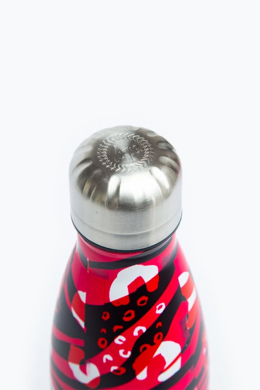 Keeping you hydrated, in style. Meet the HYPE. pink & black zebra metal reusable bottle, perfect for when you're on the go. Designed in Aluminium to ensure your water stays ice-cold and for chillier days, keeping your oat milk latte warm for longer. Why not grab one of our lunch bags or backpacks with a bottle holder to complete the look, we suggest grabbing the matching set.