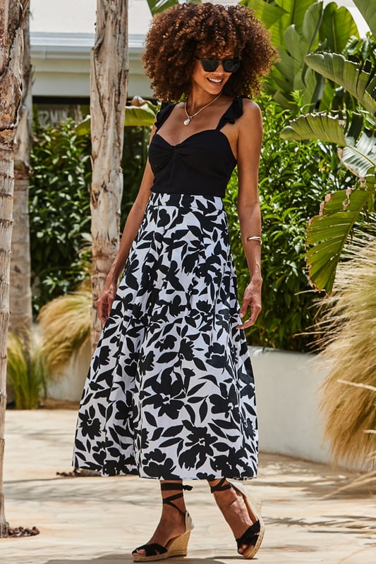 We're obsessed with it too
High waist, pleat detail - it's cut to flatter
Ultra-feminine full midi hem
Monochrome florals always look chic
Style with strappies and a Bardot top for special occasions
Dress it down with a vest top and sandals