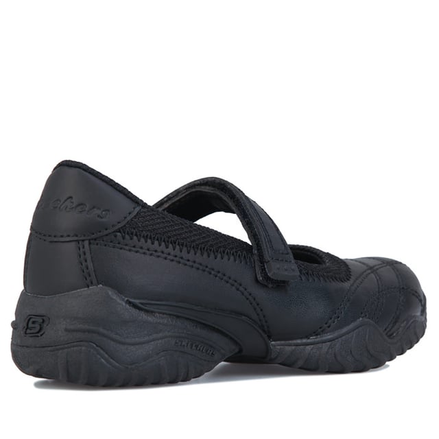 Junior Girls Skechers Velocity Pouty Shoes in black.- Synthetic and leather upper.- Hook and loop closure.- Single strap.- Skechers label on strap and heel.- Stitched detailing throughout. - Lightweight.- Cushioned insole.- Leather and synthetic upper  Textile lining  Synthetic sole.- Ref: 81264LBBKJ