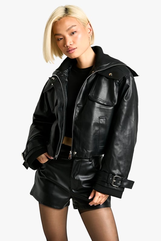 Keep things casual but always on-trend with a piece of outerwear perfection, the bomber jacket. A light jacket featuring a gathered, ribbed waistband and matching cuffs, a bomber jacket is versatile, timeless, and the perfect way to edge up your casual wear. Wear your new women's bomber jacket with a shirt and stripe joggers for the hottest look of the moment: sports luxe, or layer a varsity jacket over a t shirt dress for a fresh new-season look.Style: Bomber JacketFabric: Faux LeatherSleeve Length: Long Sleeve