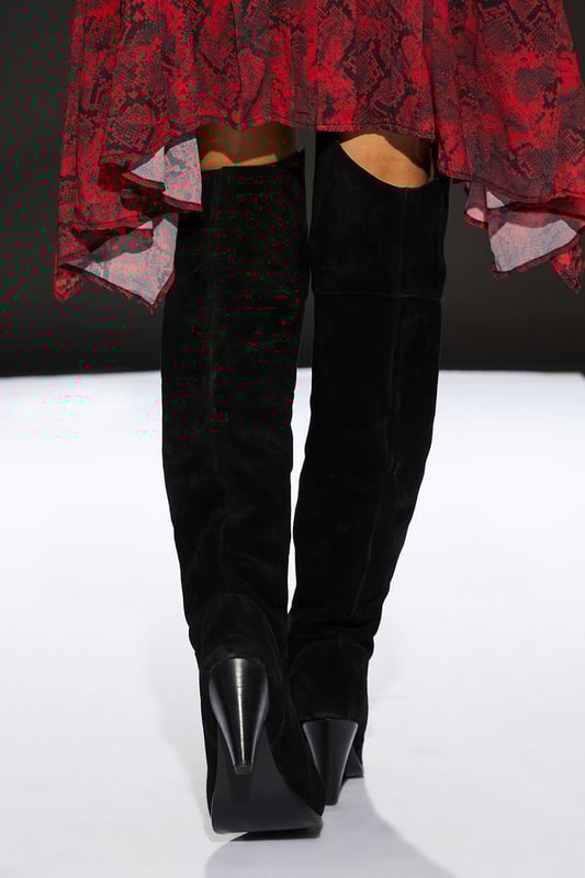 Luxurious suede over-the-knee boots
        Sleek pointed toe design
        Striking conical heel between 7 and 9cm
        Versatile day-to-night style
        Smooth, form-fitting silhouette
    
    Step into sophistication with these stunning over-the-knee boots from RUNWAY 1.8.1.8. The sumptuous suede texture and sleek silhouette create a look that's both elegant and edgy. Perfect for transitioning from day to night, these boots offer versatility in spades. Pair them with a flowing maxi dress for a romantic evening ensemble, or style with skinny jeans and an oversized jumper for a chic daytime look. The conical heel adds just the right amount of height without sacrificing comfort, making these boots ideal for long days at the office or nights out on the town. Whether you're dressing up or down, these boots will add a touch of glamour to any outfit, ensuring you stand out from the crowd with effortless style.