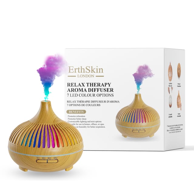 The Relax Therapy Aroma Diffuser is an elegant and efficient device designed to enhance your environment with soothing aromas. Its sleek design fits seamlessly into any room décor, while its ultrasonic technology ensures a fine mist of essential oils is dispersed into the air without heat, preserving the integrity of the oils. With adjustable settings for mist intensity and LED lighting options, it creates a calming atmosphere perfect for relaxation, meditation, or simply enjoying a fragrant space.

Benefits:
Promotes Relaxation: The diffuser disperses essential oils known for their calming properties, helping to reduce stress and anxiety.

Improves Sleep Quality: Using calming scents like lavender can enhance sleep quality and help with insomnia.

Enhances Mood: Aromatherapy can elevate mood and create a positive atmosphere, making it ideal for home or office use.

Air Purification: Essential oils like eucalyptus or tea tree have natural antibacterial properties, helping to purify the air and reduce airborne pathogens.

Customizable Experience: With various mist settings and light options, users can tailor their aromatherapy experience to suit their preferences.

Easy to Use: Simply add water and a few drops of your favorite essential oil, and the diffuser takes care of the rest.

Safe and Eco-friendly: Unlike candles, the diffuser does not produce smoke or soot, making it a safer option for homes with children or pets.

Portable and Versatile: Its compact design allows for easy transport, making it suitable for use in various settings, including bedrooms, living rooms, offices, or during travel.