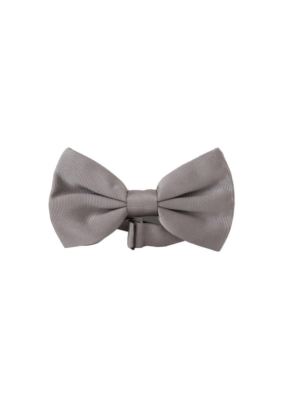 Stunning Dolce & Gabbana gray silk bow tie
  Made with 100% silk
  Timeless gray color
  Adjustable length neck strap
  One size fits all
  Expertly crafted in Italy
  Width: 7cm
  Versatile accessory for formal and special occasions
Material: 100% Silk