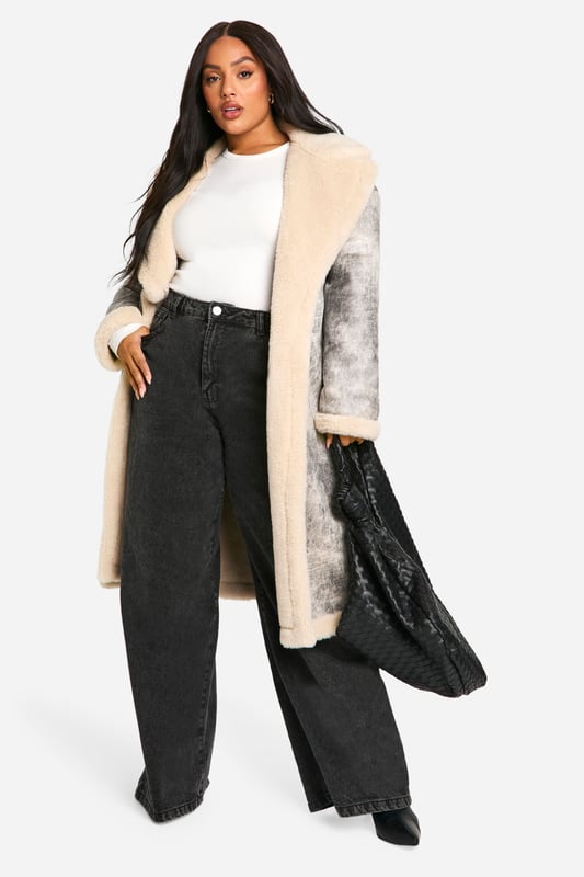 Add the finishing touch to your outfit with this outerwear piece from our women's plus size coats range. A wardrobe staple that's perfect for layering, this style provides added warmth and adds an extra something to your fit. Made with added fabric for the perfect fit, this piece is a whole vibe - just throw on over your fave outfit and you're sorted. Whether you choose a plus size denim jacket or keep things cosy in winter with a plus size teddy coat we've got the hottest coats for curvy girls that are always on-trend. Style: Aviator Jacket
