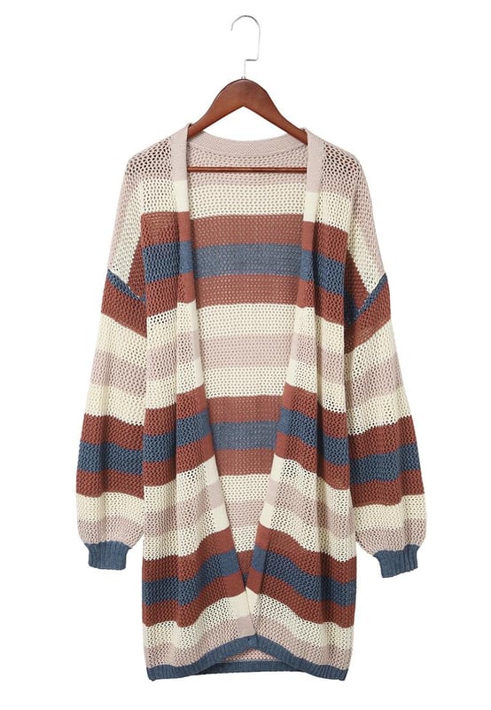 Striped color block design
  Hollowed knit pattern
  Made for women
  Relaxed fit
  Versatile and stylish
  Comfortable fabric
  Perfect for layering
  Elevates any outfit
Material: 55% Acrylic 45% Cotton