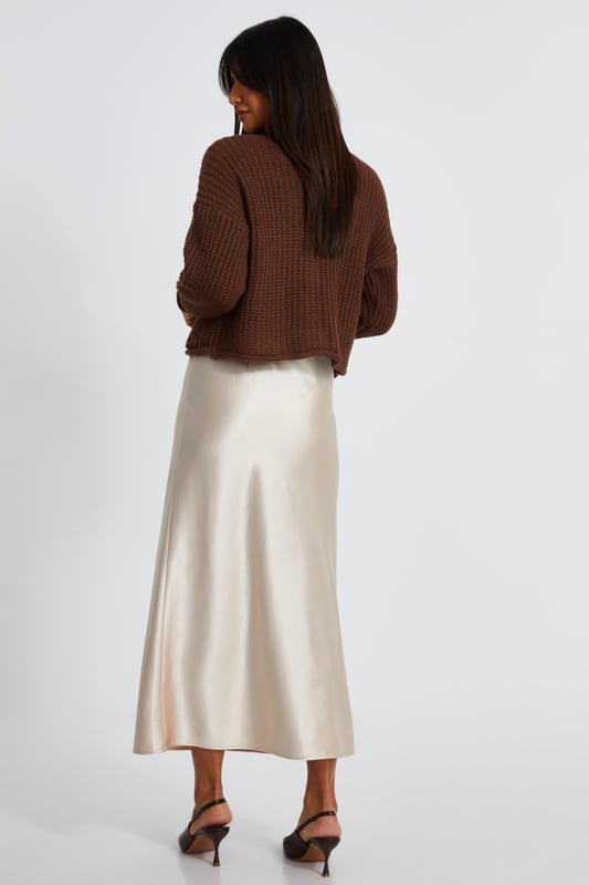 - Knitted finish - Round neckline - Button front - Relaxed fit - Model height: 5'8" - Model wears uk 8 / us 4 / eur 36 - Always check the wash care label - Cool hand wash with mild detergent