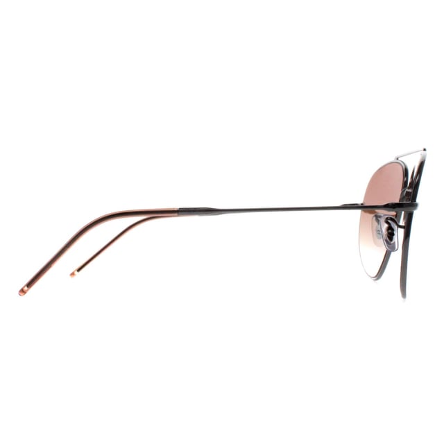 Ray-Ban Aviator Unisex Gunmetal Brown Gradient RB0101S Aviator Reverse  Sunglasses are a captivating reimagination of the classic aviator design. Crafted with meticulous attention to detail, these sunglasses feature a striking reverse color scheme, accentuating the iconic teardrop-shaped lenses and sleek metal frame. The bold contrast of colors adds a contemporary edge while maintaining the timeless appeal of the Aviator style. Engineered for both style and durability, these sunglasses offer superior UV protection and comfort, making them an essential accessory for those who appreciate fashion-forward design and unparalleled quality.