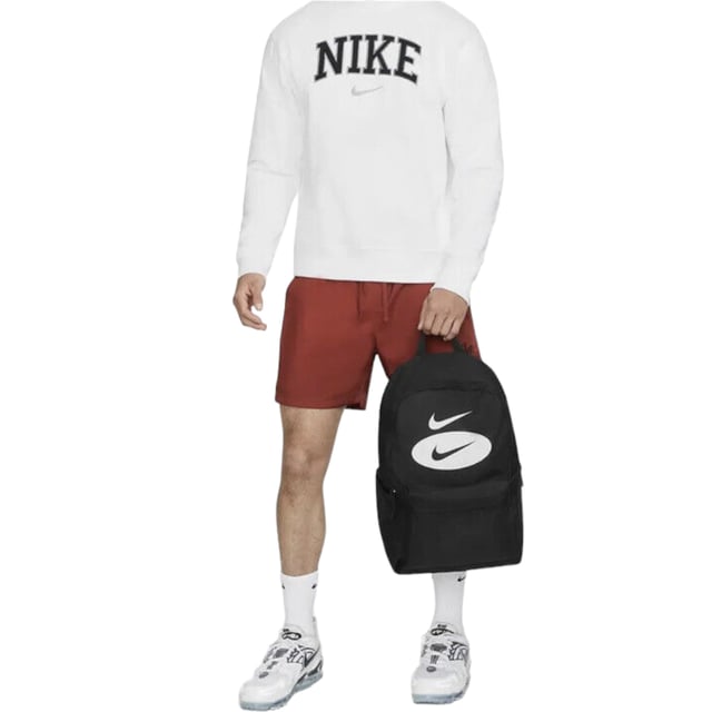 Grab your gear and hit the road in style. An accessory from the Swoosh League collection, the Nike Heritage backpack features printed Swooshes and two zippered pockets so you can neatly store your belongings while keeping them close at hand. This product is made with at least 65% recycled polyester fiber. Large main compartment for easy access to your belongings, and interior pocket to store a laptop up to 15 inches. Additional zip compartments for organized, secure and convenient storage of your keys, wallet and phone. Densely woven polyester for a secure fit. Padded back and shoulder straps for added comfort. 25 Litre
43cm H x 30cm W x 15cm D (approx)