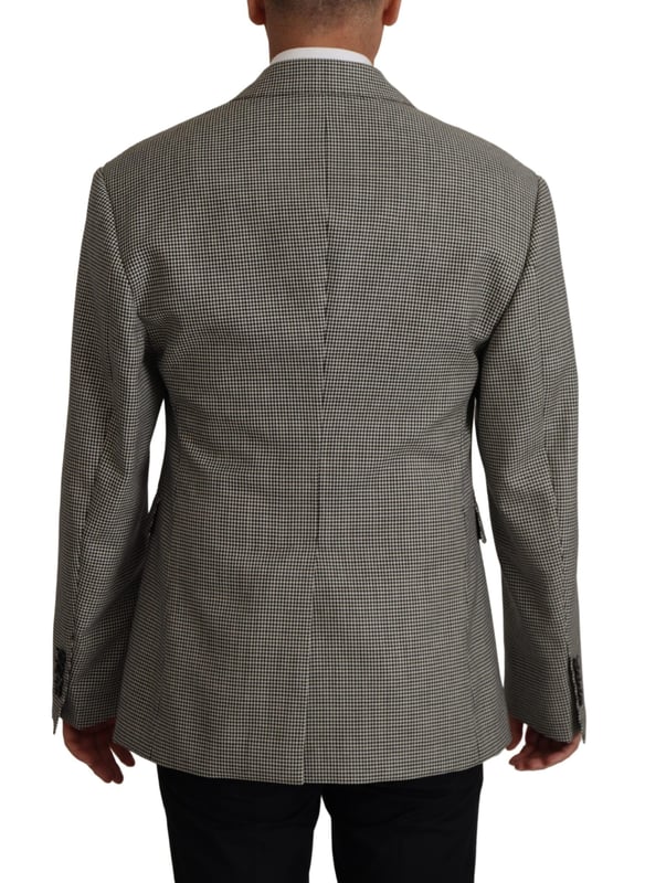 100% authentic Dolce & Gabbana Gray Checkered Wool Blazer
  New with tags
  Single breasted with notch lapels
  Made in Italy
  Gray checkered color
  1 button fastening
  Logo details
  Material: 100% virgin wool
  Lining: 100% Silk
Material: 100% Virgin Wool