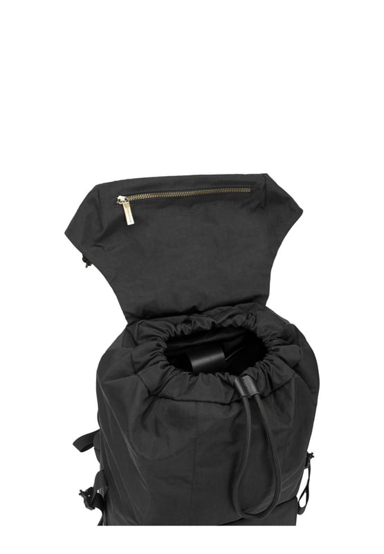 Cut from our signature nylon, the Flapover Nylon Backpack’s adjustable flap over opening provides easy access to your essentials with a secure double clip fastening. Inside there is ample space for a 15” laptop, twinned with external front and rear pockets for additional storage options. Features: , Flap over opening, Internal drawstring opening Front flap over zip pocket, Rear zip pocket, Internal flap over zip pocket SMITH & CANOVA antique brass logo, Branded antique brass zips, Padded grab handle, Adjustable padded backpack straps, Internal 15 inch padded laptop sleeve, Internal zip pocket, 2 Internal mobile phone slip pockets - fits normal and plus size smart phones, 2 Internal pen slip pockets Style Ref: 92680 BLACK
