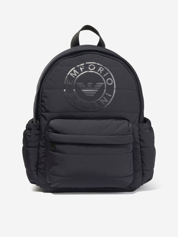 Elevate your young one's style with the Emporio Armani Boys Logo Backpack in Navy (37cm). Crafted for the AW2024 season, this chic piece blends functionality with high-end fashion aesthetics. Perfect for school or weekend adventures, here's why it's essential:‚ Iconic Armani Logo: Features the esteemed Emporio Armani logo, synonymous with luxury and quality.  ‚ Premium Navy Blue Fabric: High-quality material ensures durability and longevity.  ‚ Ergonomic Design: Adjustable straps and lightweight structure offer comfort and support for all-day wear.  ‚ Versatile &amp; Stylish: Timeless navy hue complements various outfits, elevating your boy's fashion game.Gift a touch of designer elegance to your young one's essentials. Get the Emporio Armani Boys Logo Backpack today!