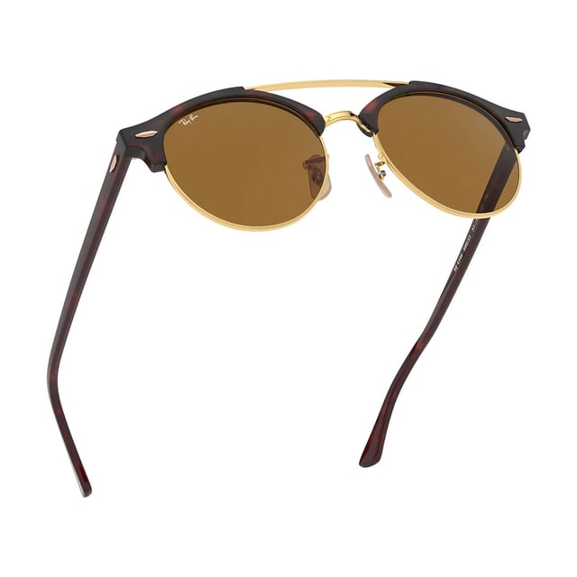 Clubround Double Bridge sunglasses with acetate frame with metallic finish on the lower part of the lenses.
 Round oval shape.
 Acetate temples with the brand name in metal.
 100% UV protection.
 Anti-reflective crystals.
 All our products are shipped inside their original packaging.
 Includes a glass cleaning cloth, certificates of authenticity and warranty.
 Measures: Lens width: 51mm. Lens height: 46 mm. Bridge: 19 mm. Temples: 145 mm.
 Composition: Acetate
 Care:
Cleaning and maintenance:
 - Clean the glasses with soap and water.
 - Do not use dirty or abrasive cloths, which may alter the characteristics of the filters.
 - Use only original accessories and spare parts.