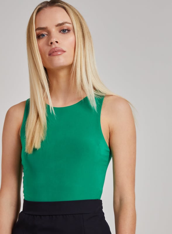 Sleek and sexy, with the perfect fit! This bodysuit is a must have for your next night out! 95% Cotton, 5% Elastane. Made in UK. Do Not Bleach. Do Not Tumble Dry. Cool Iron On Reverse. Do Not Dry Clean. Model wears size S. Model height: 5'3" / 160cm