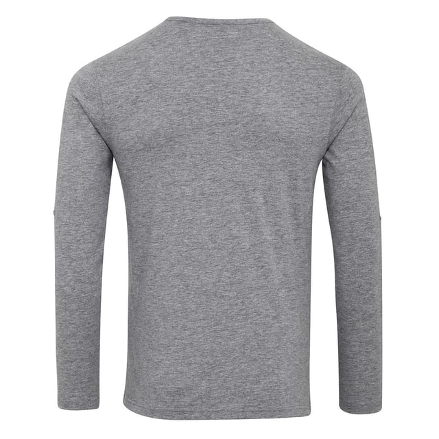Tee met lange mouwen. Voorzien van rolmogelijkheden met knoopsluiting aan de binnenzijde van de mouw om deze vast te zetten. Ronde hals stijl met drie een knoopsluiting. Tweelingnaaldstiksel aan de zoom en de manchet. Wasvoorschriften: Huishoudelijk wassen op 40 graden.