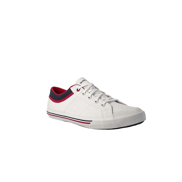 Le Coq Sportif Saint Gaetan GS CVS Kids White Plimsolls, a classic and versatile choice for children that effortlessly combines style and comfort. These plimsolls are designed to provide kids with a comfortable and fashionable option for their everyday activities. Let's explore the key features that make the Le Coq Sportif Saint Gaetan GS CVS a standout choice:

 Timeless Design:  The Saint Gaetan GS CVS plimsolls from Le Coq Sportif feature a timeless and clean white design that is both classic and stylish. Their simplicity allows them to pair easily with various kids' outfits.

 Child-Friendly Sizing:  Le Coq Sportif offers a range of sizes specifically designed for children's feet, ensuring a perfect fit for your little ones.

 Canvas Upper:  Crafted with durable canvas material, these plimsolls provide breathability and flexibility, making them comfortable for all-day wear.

 Low-Top Silhouette:  The low-top design is easy to put on and take off, making it convenient for kids who are learning to dress themselves.

 Secure Closure:  The plimsolls feature a hook-and-loop (Velcro) strap closure, allowing kids to fasten and adjust the fit with ease, promoting independence.

 Comfortable Insole:  The insole is designed to provide cushioning and support, ensuring comfort during various activities and play.

 Le Coq Sportif Logo:  The Le Coq Sportif logo is subtly incorporated into the design, representing the brand's dedication to quality and style.

 Versatile Wear:  These plimsolls are versatile and suitable for a wide range of kids' activities, from school to playdates and casual outings.

 Durable Outsole:  The rubber outsole offers reliable traction and durability, providing stability as kids explore different surfaces.