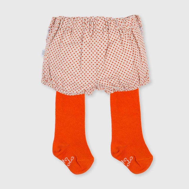 Bloomers with tights.
 Bloomers:
 Elastic waistband at the back.
 Button closure on the sides.
 Adjustable waistband with internal elastic
 Seams seen in tone.
 Leotards:
 Brand name on the plant.
 Composition: Bloomers: 100% Cotton; Leotards: 80% Cotton, 17% Polyamide, 3% Elastane
 Care:
Wash maximum at 30ºC.
 -Do not iron.
 - It is not allowed to use a dryer.
 - Do not use bleach.
 - Does not support dry cleaning.