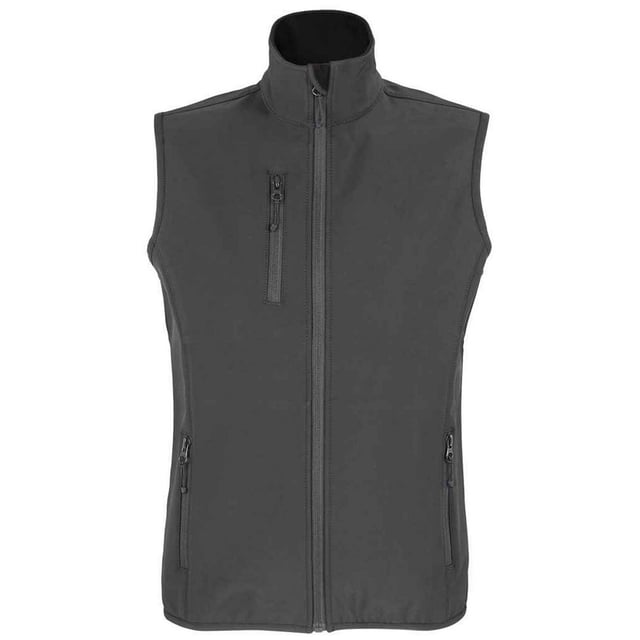 Outer Materials: 94% Recycled Polyester, 6% Elastane. Lining: Fleece, Polyester. Fabric: Softshell. Design: Plain. Fabric Technology: Breathable, Waterproof, Windproof. Bound Armholes, Chin Guard, Elasticated Arm Holes, Inner Zip Guard, Tearaway Label, Three Layers. Sleeve-Type: Sleeveless. Neckline: Standing Collar. Pockets: 1 Chest Pocket, 2 Lower Pockets, Zip. Fastening: Full Zip. Hem: Bound, Elasticated. Sustainability: Amfori, BSCI, Fair Wear Approved, GRS Certified, Oeko-Tex Standard 100 Certified, PETA-Approved Vegan, REACH.