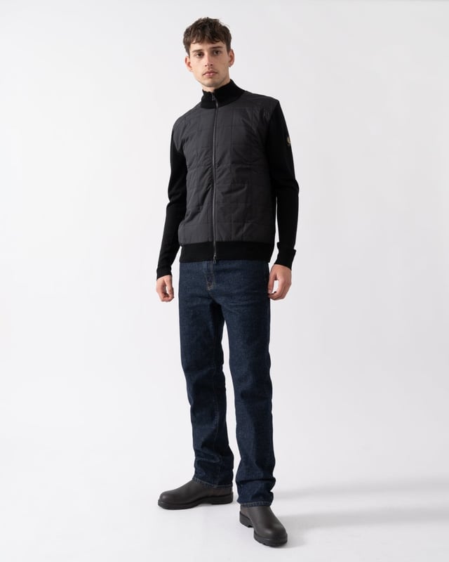 The Kelbrook zip cardigan. Inspired by military uniforms and made for updating your daily wardrobe, this boxy zip-through knit combines structured panelling with soft merino wool for an elevated finish.

Extra fine merino
Channel quilted shoulder reinforcement detailing
Ribbed cuffs and hem
Quilted mixed media body
Belstaff phoenix patch on left sleeve
Two-way zip centre front closure
Non-mulesed wool

Body: 100% wool, Woven: 100% polyester, Filling: 100% polyester
105303