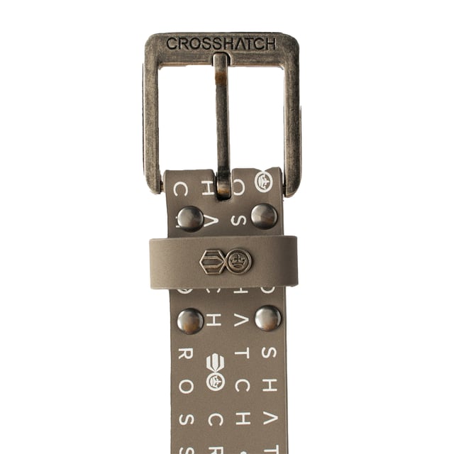 Fabric: Faux Suede. Material: Synthetic Leather. Fastening: Buckle, Pin. Notched. Design: Repeat Logo, Studded.