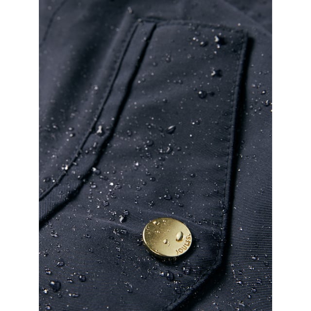 A practical and stylish addition to our Right as Rain collection, the Portwell raincoat is a true wet-weather essential. To ensure you will stay dry in any downpour, it's waterproof with fully taped seams. Other weather-beating details include an adjustable hood with storm peak and a stom flap to the back which allows droplets to roll away from the back of the coat. An adjustable waist with internal toggles allows you to cinch the coat in for a flattering fit, while a concealed zip and popper fastening creates a clean, sleek finish. It's completed with front pockets with popper fastenings, adjustable cuffs and a half-body lining.