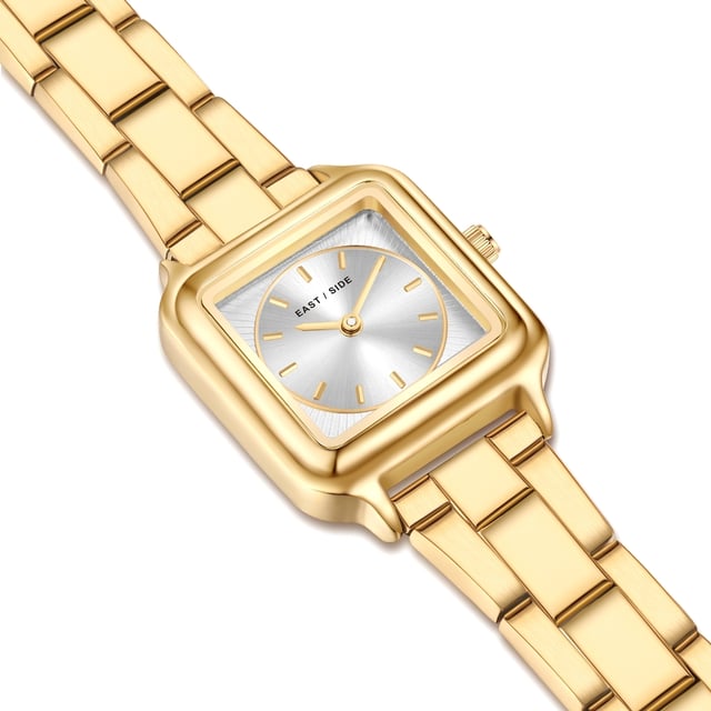 GENERAL INFORMATION:  • Targetgroup: Female  • Wristwatch: No Special Functions  • Display: analogue  • Weight of watch w/o box (gr.) - approx.: 60  MOVEMENT:  • Movement: Quartz  • Term of Movement: 2025  • Origin of movement: Japan  BRACELET:  • Material of bracelet/strap: Stainless steel  • Plating of bracelet/strap: Ion-Plating (IP)  • Finishing of bracelet/strap: Smooth  • Finishing/Decoration of bracelet/strap: None  • Clasp/Closure/Buckle: Security-folding clasp  • Color of bracelet/strap: Yellowgold  • Length of bracelet/strap (mm) approx.: 210,0  • Width of bracelet/strap (mm) approx.: 13,8  • Style/Design of bracelet/strap: Link bracelet  • Bracelet/strap adjustable?: Yes  CASE:  • Shape of case: Square  • Size/Diameter of case in mm . approx.: 25,0 x 32,0  • Height of case in mm: 8,1  • Case material: Metal (Alloy)  • Surface of case: Polished  • Bezel/Topring: Fixed  • Finishing/Decoration of case: None  • Material of case back: Stainless steel  • Lock of case back: No screwed-in crown  • Color of case: Yellowgold  • Coating/Plating (Case): Ion-Plating (IP)  • Type/Form of crystal: Flat  • Material of crystal: Mineral crystal  DIAL:  • Size jewelry care cloth: Hour, Minute  • Indices: Line indices  • Material of dial: Brass  • Structure/pattern of dial: Flat/sunray  • Color of dial: White  PUSHER, CROWN, HAND:  • Pusher: None  • Corrector: No  • Crown: No screwed-in crown  • Type of hands: Pole hand  • Luminescent (hands): No  PACKAGING & SCOPE OF DELIVERY:  • Box: Yes  • Service booklet: Yes  • Manual: Yes